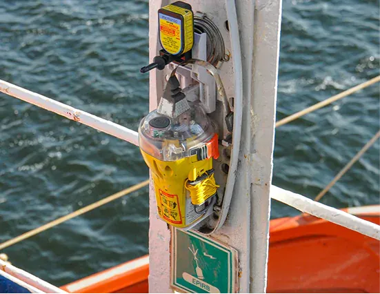 EPIRB emergency beacon mounted on a vessel rail