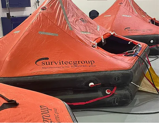 Inflatable life raft deployed at sea